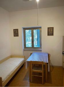 A bed or beds in a room at Villa Margherita