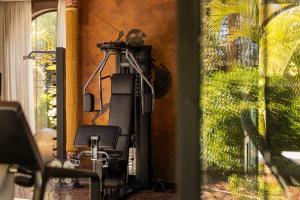 a sewing machine in a room next to a window at Palais Ronsard Relais & Chateaux in Marrakesh