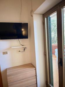 A television and/or entertainment centre at Villa Margherita
