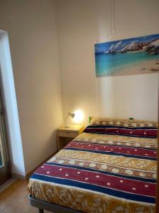 A bed or beds in a room at Villa Margherita