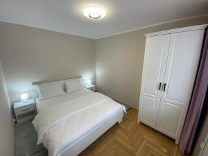 Ένα ή περισσότερα κρεβάτια σε δωμάτιο στο Apartament S26