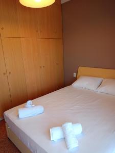 Postel nebo postele na pokoji v ubytování Serenity Apartment