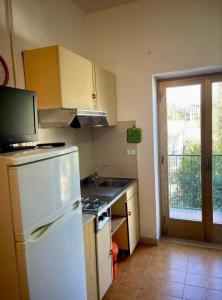 A kitchen or kitchenette at Villa Margherita