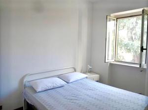 A bed or beds in a room at Villa Margherita