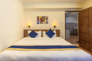 Letto o letti in una camera di Kathmandu Business Hotel