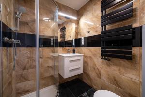 Ένα μπάνιο στο Apartament Dom Goscinny Justyna