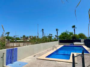 Swimmingpoolen hos eller tæt på Adosado en Playa Casablanca