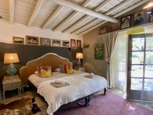 Ένα ή περισσότερα κρεβάτια σε δωμάτιο στο Casa Stardust & cottages +291 φωτογραφίες