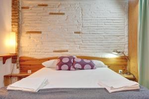 Łóżko lub łóżka w pokoju w obiekcie Casa Ana Mari II by Clabao