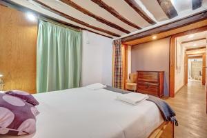 Łóżko lub łóżka w pokoju w obiekcie Casa Ana Mari II by Clabao