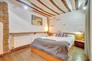 Łóżko lub łóżka w pokoju w obiekcie Casa Ana Mari II by Clabao