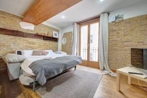 Łóżko lub łóżka w pokoju w obiekcie Casa Ana Mari II by Clabao