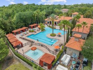 an overhead view of a pool at a resort at Near Disney w/ pool-3BR/2BA-Spacious & Cozy Condo in Davenport