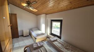 Posteľ alebo postele v izbe v ubytovaní Zocca Apartments