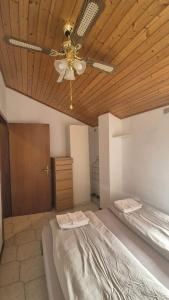 Posteľ alebo postele v izbe v ubytovaní Zocca Apartments