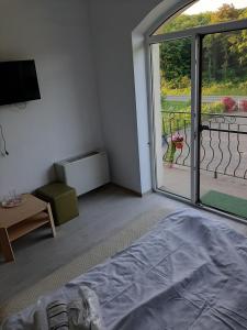 Postel nebo postele na pokoji v ubytování Sofial Guesthouse