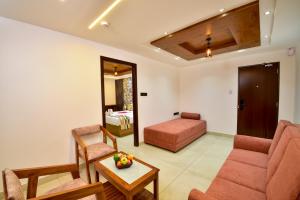 Posezení v ubytování Hotel Dain Castle, Varkala