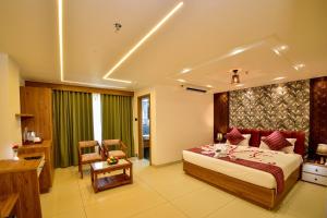 Postel nebo postele na pokoji v ubytování Hotel Dain Castle, Varkala