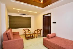 Posezení v ubytování Hotel Dain Castle, Varkala