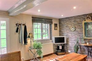 Et tv og/eller underholdning på Les Fermes Familles Bonte Bien être et nature