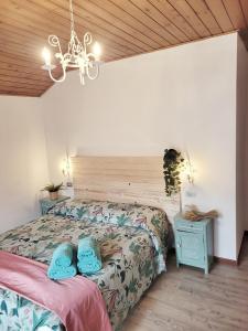 Postel nebo postele na pokoji v ubytování Casa Pepe con parcheggio