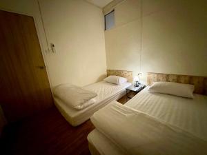 Letto o letti in una camera di The Lab Sleep Hostel