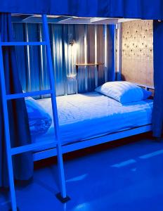 Letto o letti in una camera di The Lab Sleep Hostel