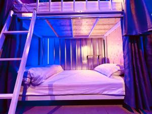 Letto o letti in una camera di The Lab Sleep Hostel