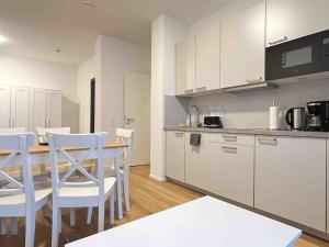 Η κουζίνα ή μικρή κουζίνα στο AM1013 - Moderne Monteur oder Ferienwohnung mit Terasse +1 φωτογραφίες