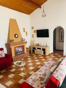 A television and/or entertainment centre at Casa MìMì