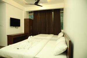 Foto de la galería de AROMA INN en Kalpatta