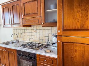 Kuchyň nebo kuchyňský kout v ubytování Casa con Abbonamento Parcheggio - Casa Nostra + 7 fotografií