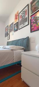 Katil atau katil-katil dalam bilik di Sant'Erminio comfort rooms