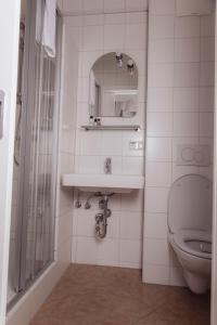 Ванна кімната в Cityhotel am Domplatz