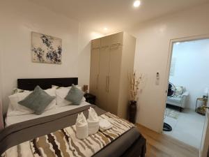 a bedroom with a large bed and a sliding glass door at 2bedrooms 2toilet& bath Matina Enclaves Condo in Davao City +100 photos