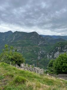 a view of the mountains from a hill at Comme à la maison in Lantosque