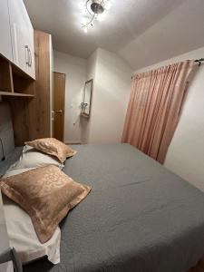 Postel nebo postele na pokoji v ubytování Apartment Lovre Topic