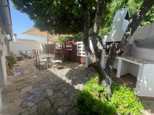 Vonkajšia záhrada v ubytovaní La casa vieja de Marchenilla + 15 fotografií