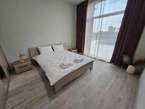 Postel nebo postele na pokoji v ubytování Dream sea apartment 2 + 18 fotografií