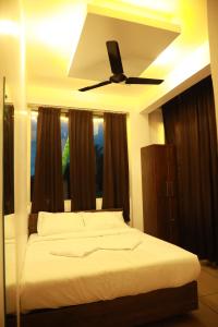 Foto de la galería de AROMA INN en Kalpatta