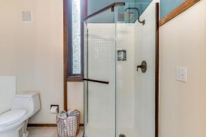 a bathroom with a shower and a toilet at Moss Beach Oceanfront Retreat about 20 Mi to San Fran! in Moss Beach +23 photos