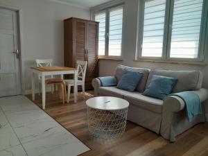Posedenie v ubytovaní Nowe Apartamenty na Gryfa