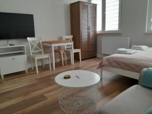 Posteľ alebo postele v izbe v ubytovaní Nowe Apartamenty na Gryfa