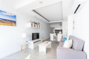 Televízia a/alebo spoločenská miestnosť v ubytovaní Apartment Meda Chica