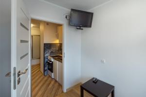 Kuchyň nebo kuchyňský kout v ubytování Skwer Kościuszki 2024 + 14 fotografií