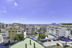 an aerial view of a city with buildings at Apartment Sunset Moraira City in Moraira