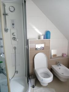 Kúpeľňa v ubytovaní Galeria Villa