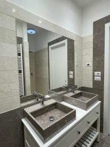 Koupelna v ubytování Suite 55 in centro