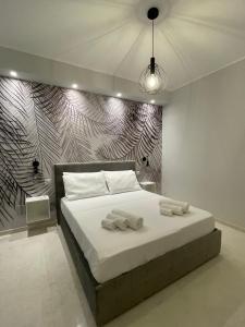 Postel nebo postele na pokoji v ubytování Suite 55 in centro