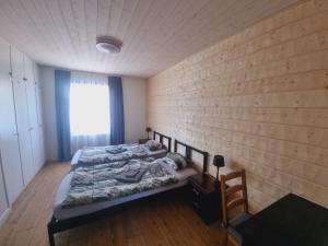 Postel nebo postele na pokoji v ubytování Elch Zimmer Wilderness Life